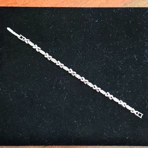 Silver Tone 7 Inch Bracelet with X and CZ Stones